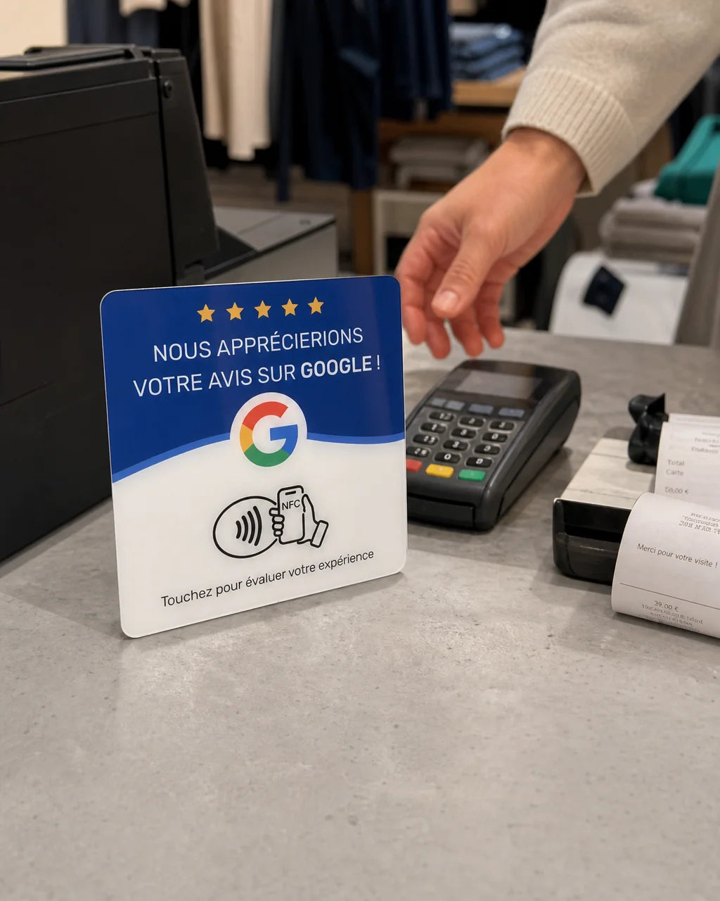 Vertical 4:5 commercial photograph of the exact sourced NFC review plaque standing beside a real bou