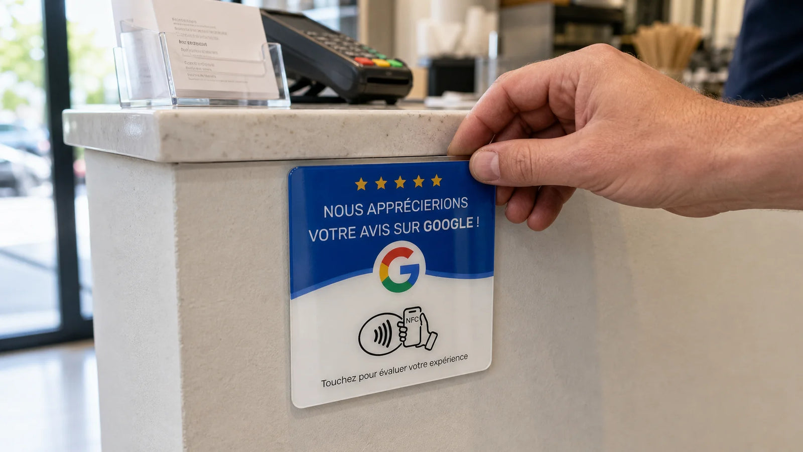 Landscape commercial installation photograph, 16:9. Show the exact sourced Plaque NFC pour avis Goog